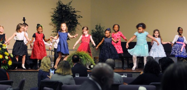 Children from Orange Park Performing Arts Academy’s Kreative Kids After School Program dance to the 1930s popular music style that Martin Luther King Jr. would have heard as a child at the Fourth Annual Dr. Martin Luther King Jr. Diversity Breakfast, Monday Jan. 19.
